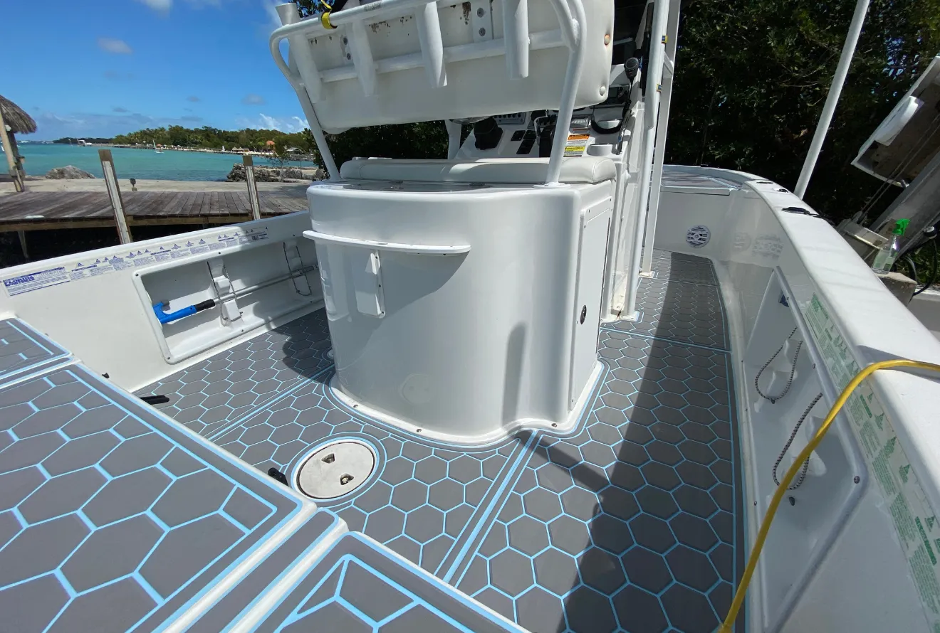 Hexagon-pattern foam decking with blue accents