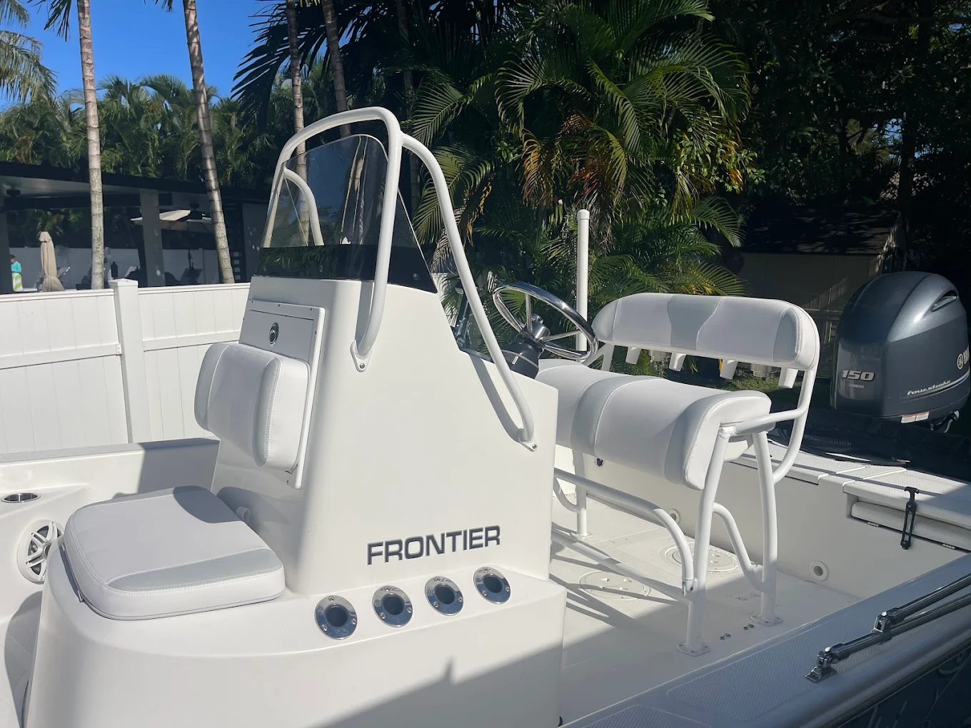 White marine vinyl helm and console seating