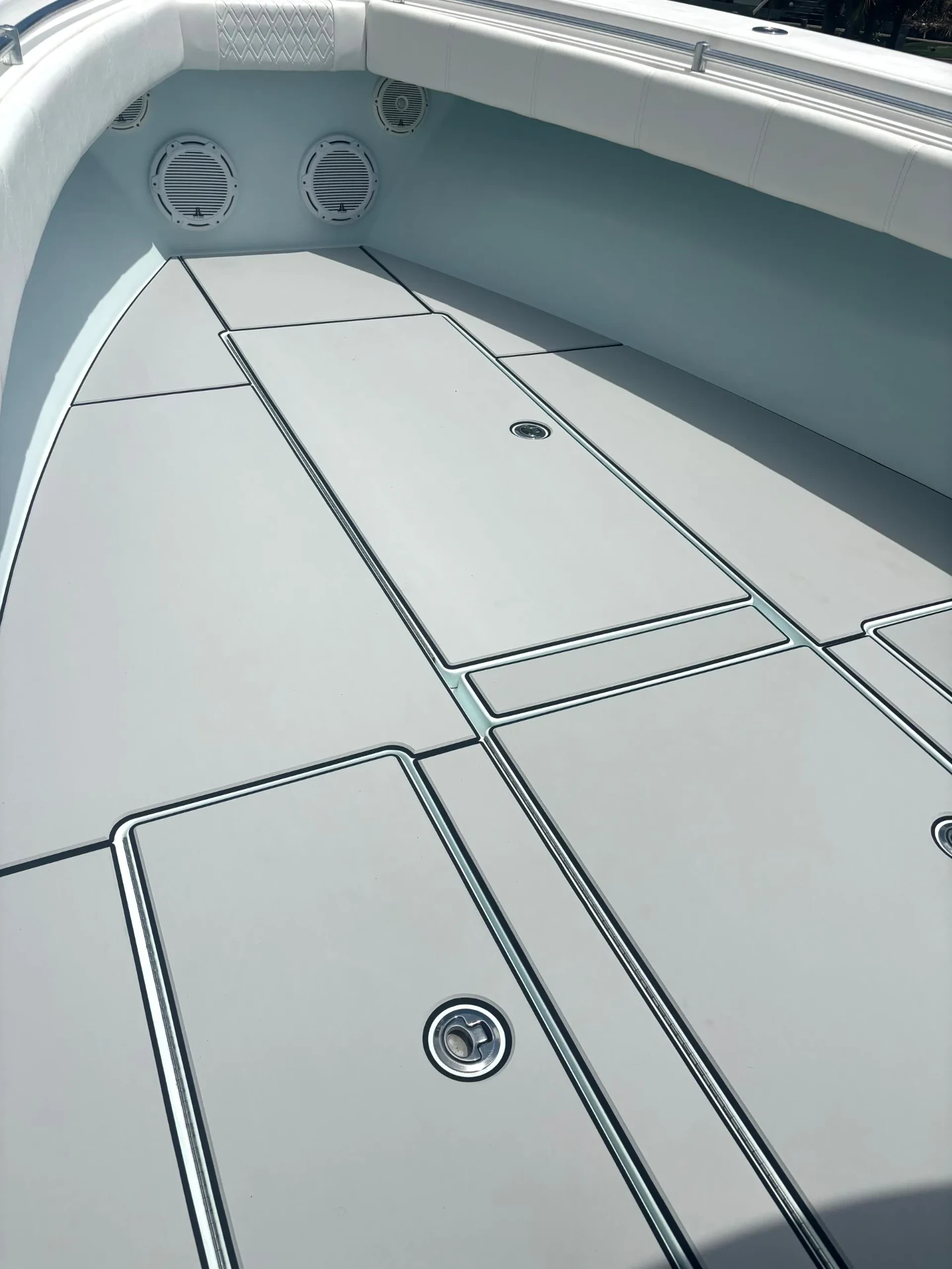 Light gray bow foam decking with black caulk lines