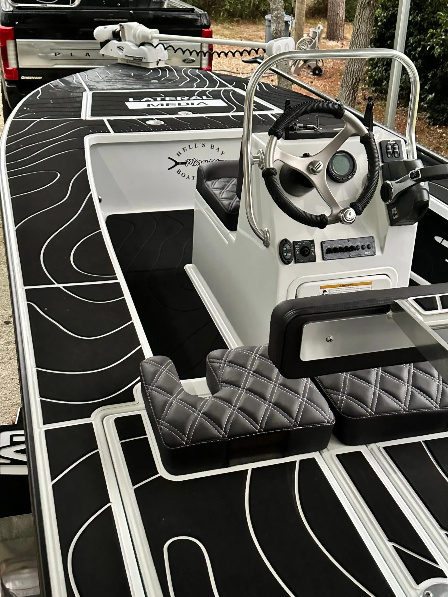 Black topographic-pattern foam decking install