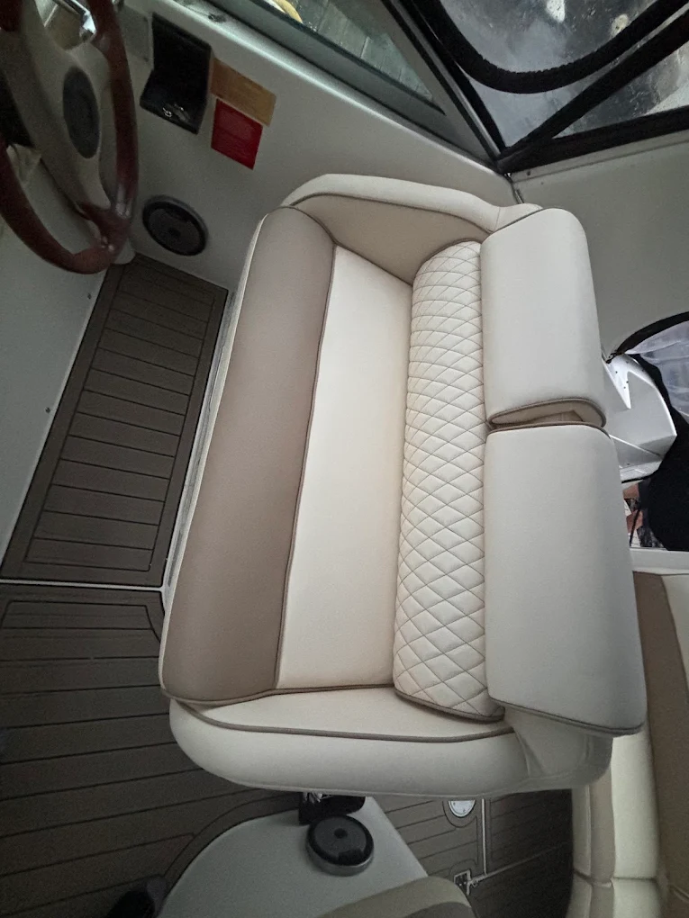 Cream diamond-stitch helm seat with tan piping