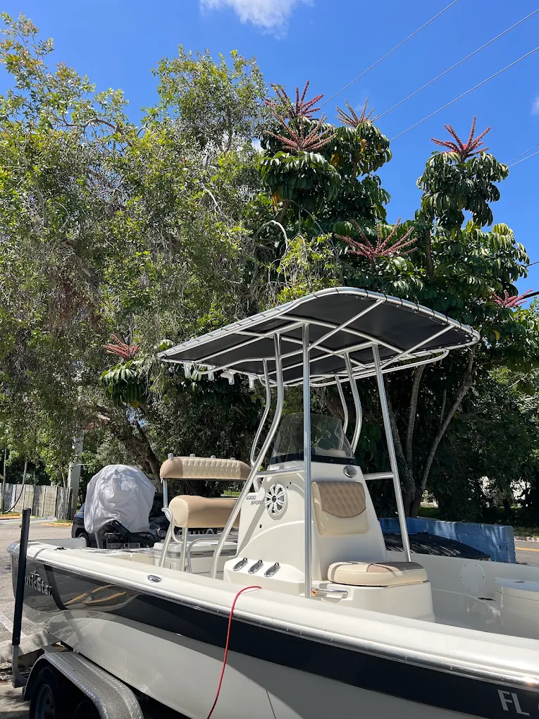 Tan console and bench upholstery on a bay boat