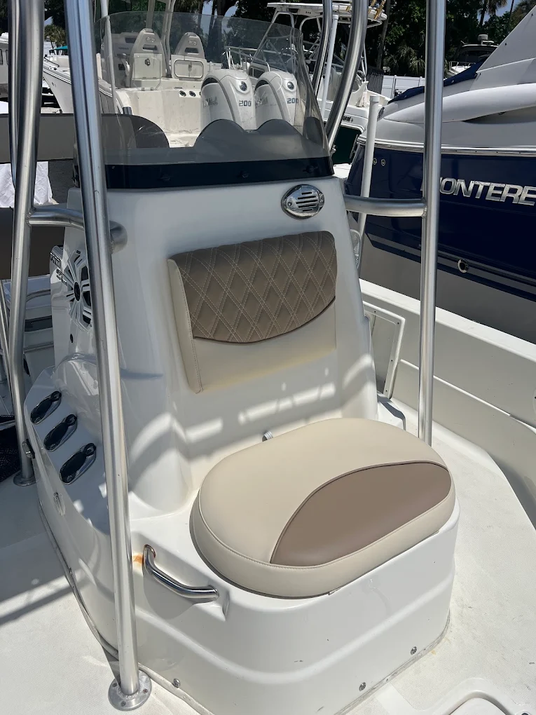 Tan diamond-stitch console cushion and seat