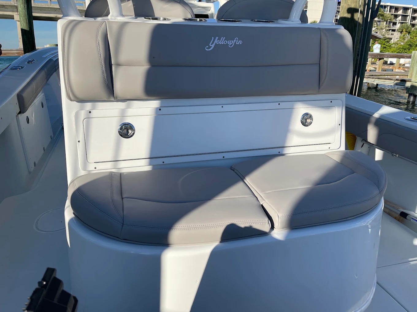 Gray leaning post backrest with embroidered logo