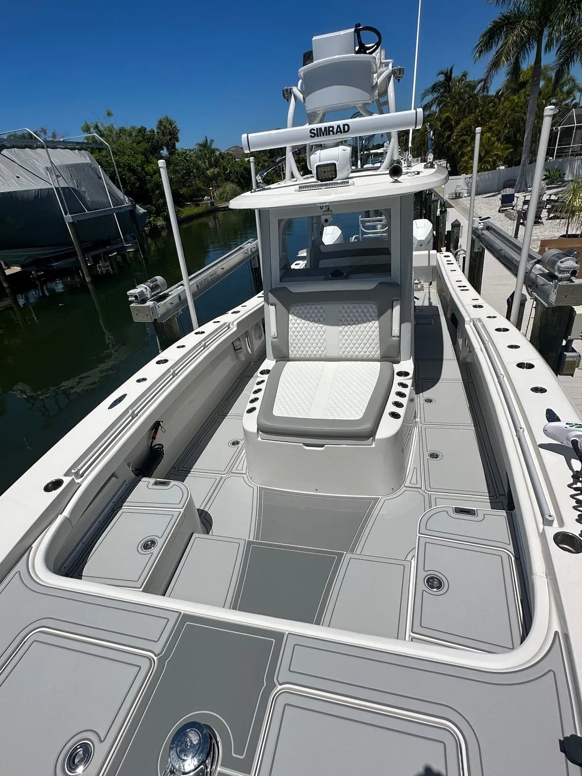 Gray foam decking across bow and cockpit